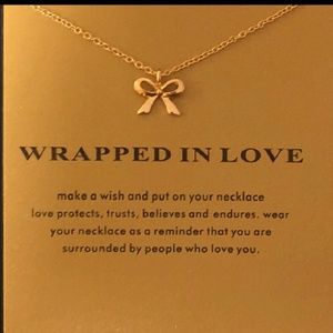NWOT WRAPPED IN LOVE NECKLACE